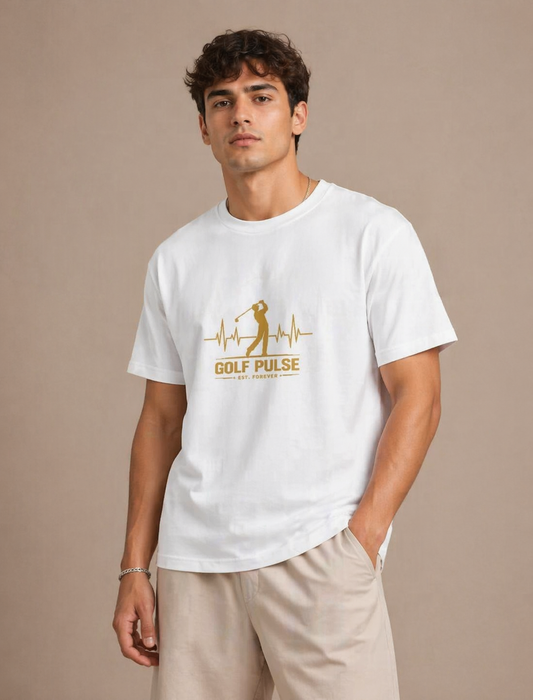 Man wearing a white t-shirt with a gold graphic and text on a beige background