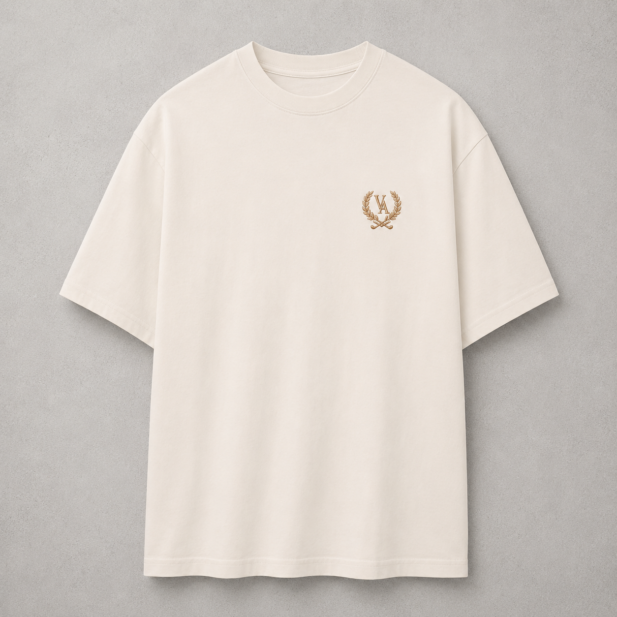Beige t-shirt with a gold emblem on a gray background