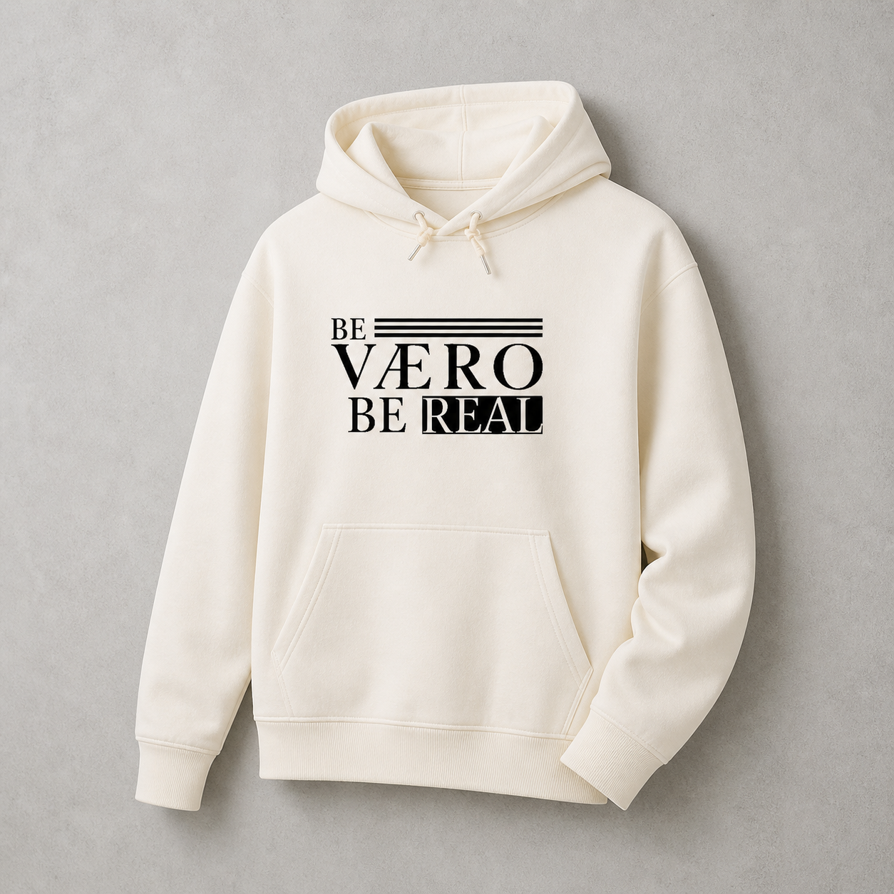 White hoodie with 'BE VAERO BE REAL' text on a gray background
