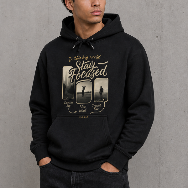 Person wearing a black hoodie with graphic design and text on a gray background