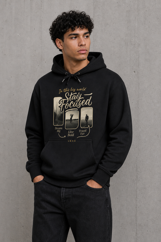 Person wearing a black hoodie with graphic design and text on a gray background