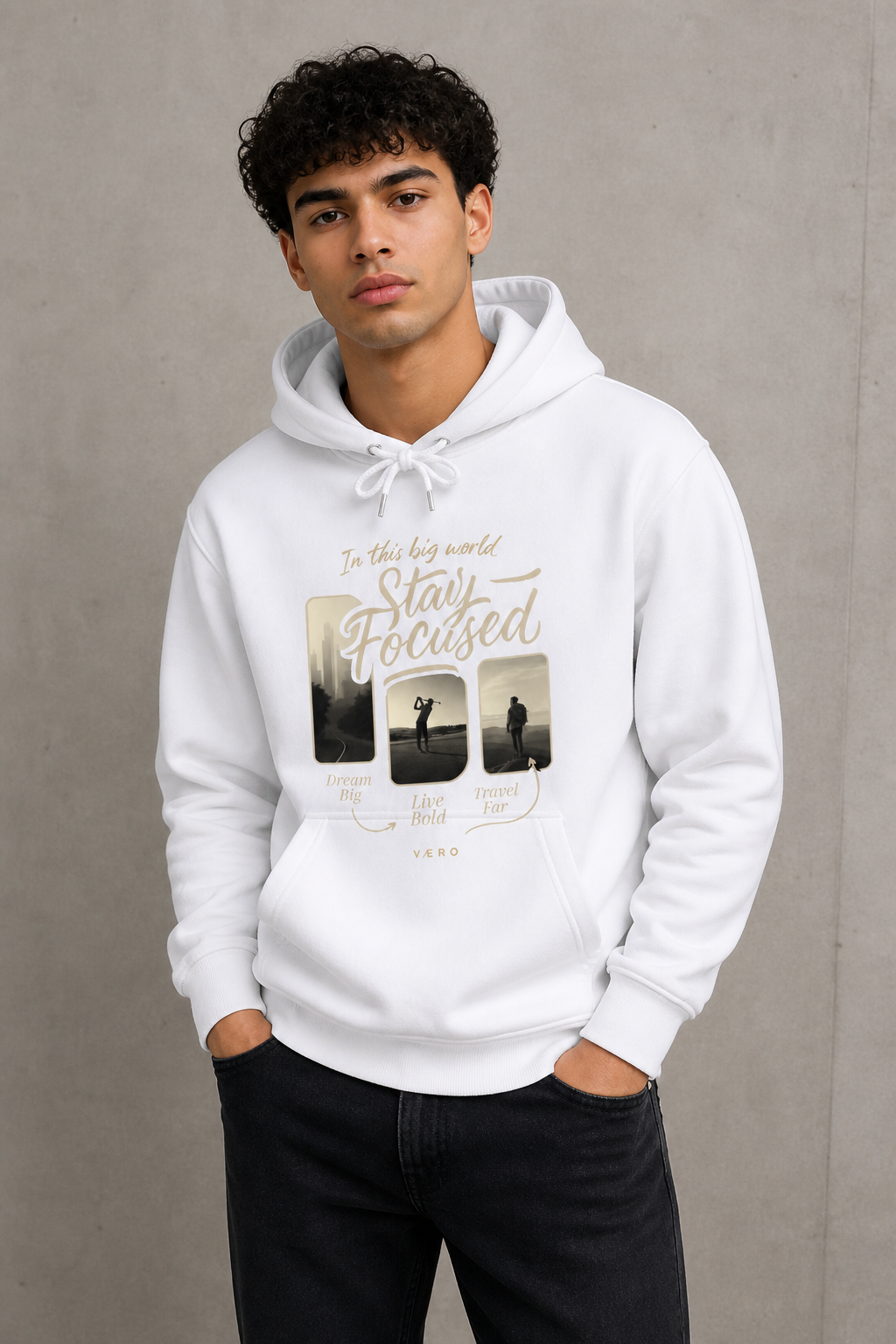 Person wearing a white hoodie with a graphic design and text on a plain background