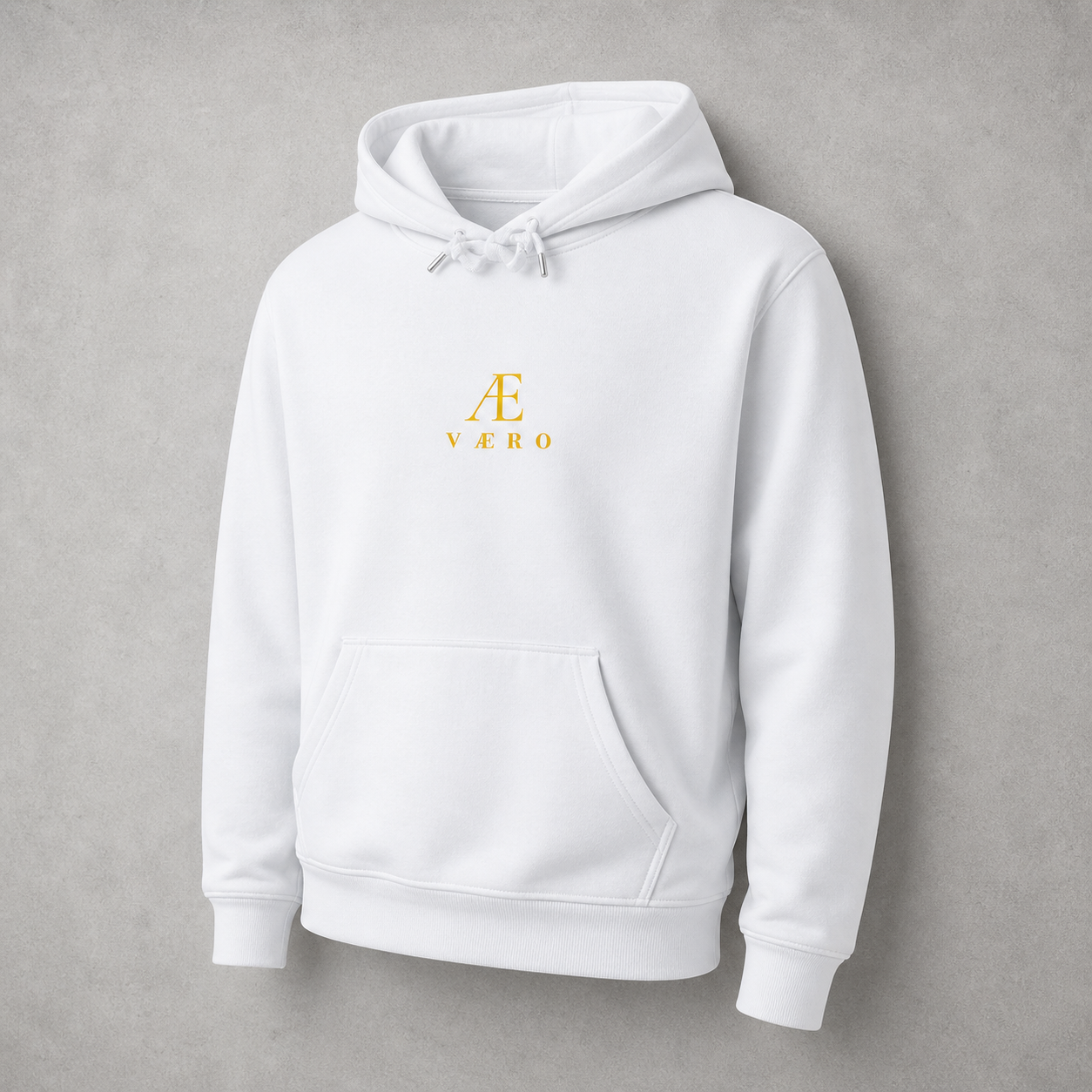 White hoodie with a gold logo on a gray background