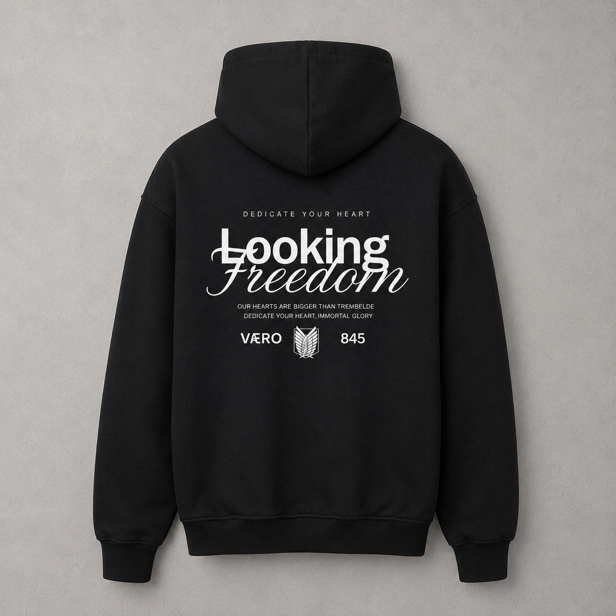 Black hoodie with 'Looking Freedom' text on the back against a gray background
