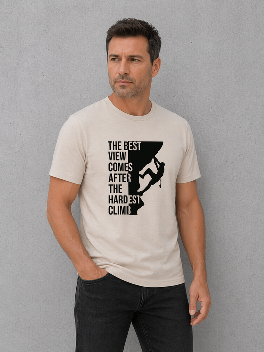 Man wearing a t-shirt with a motivational quote and graphic design against a gray background