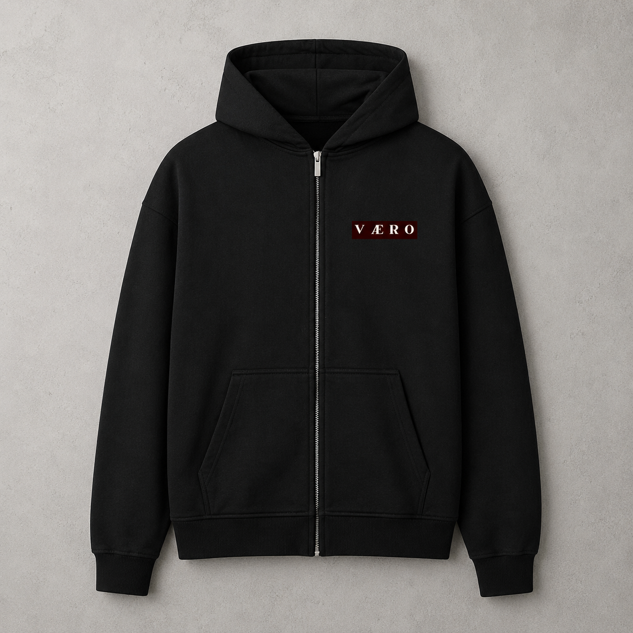 Black hoodie with 'VAERO' logo on a gray background