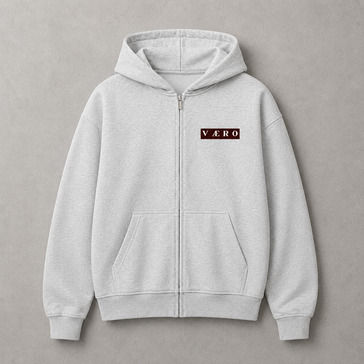 Gray hoodie with a brand logo on a gray background
