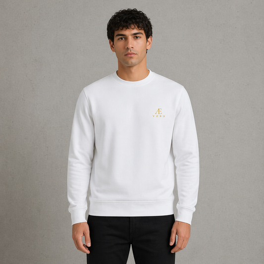 Man wearing a white sweatshirt with a logo on a gray background