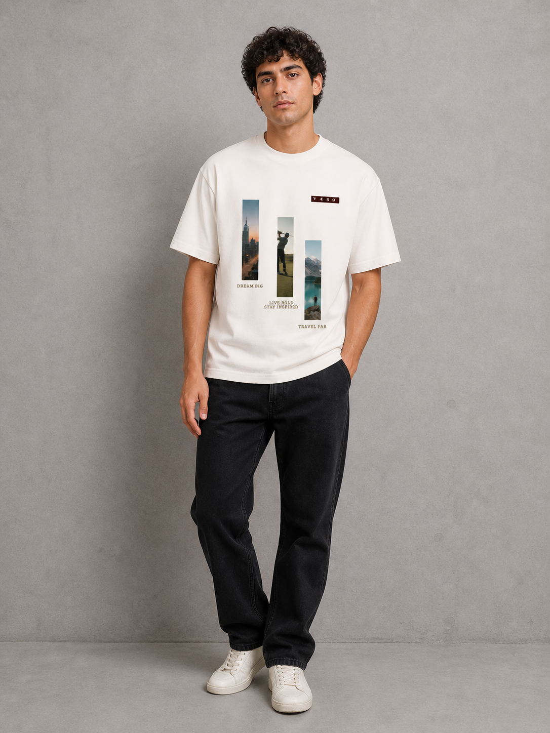 Man wearing a white t-shirt with graphic design on a gray background
