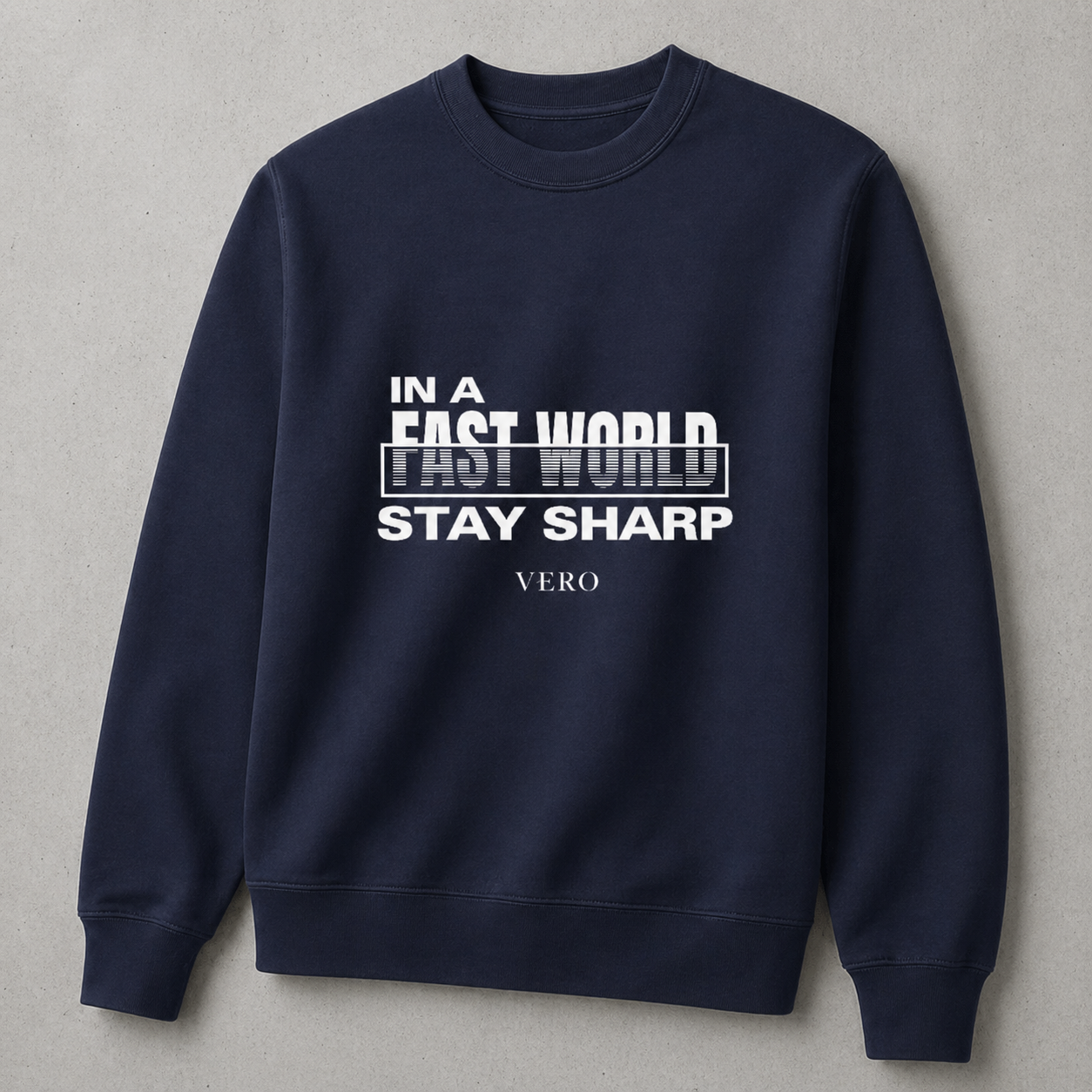 Navy blue sweatshirt with white text on a gray background