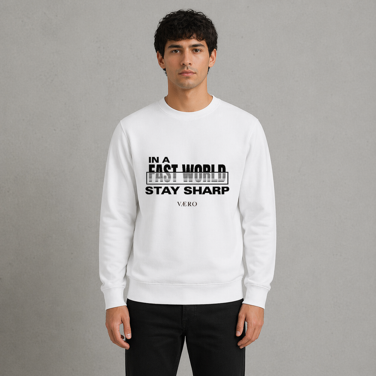 Person wearing a white sweatshirt with text on a gray background