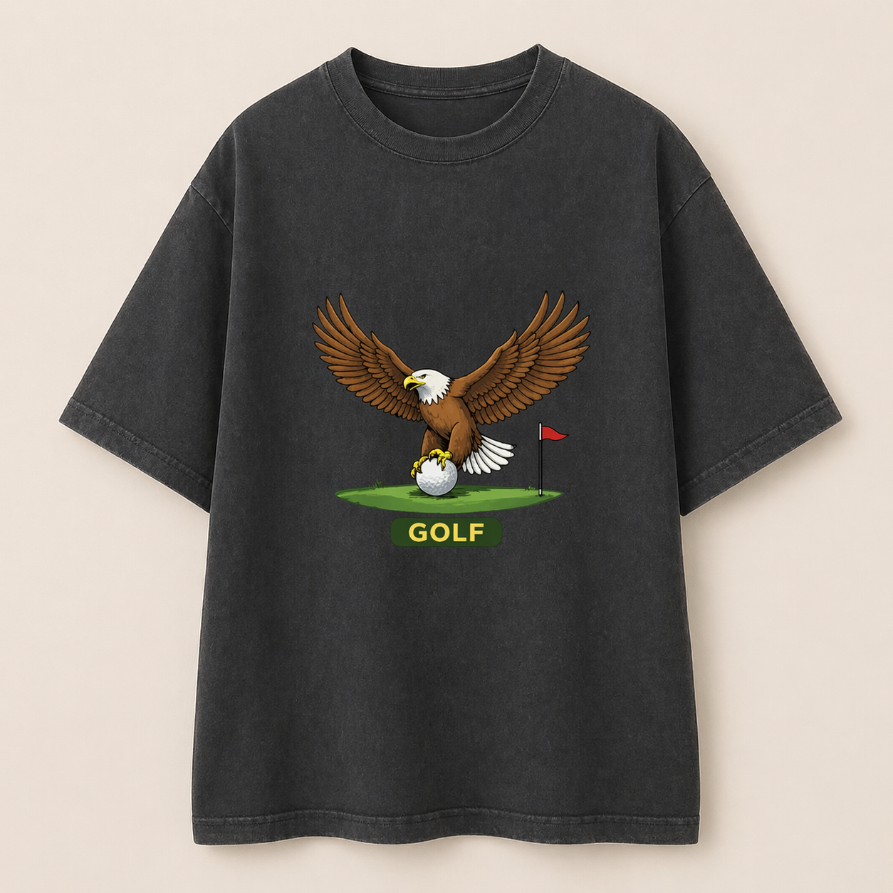 Black t-shirt with an eagle and golf ball design on a beige background