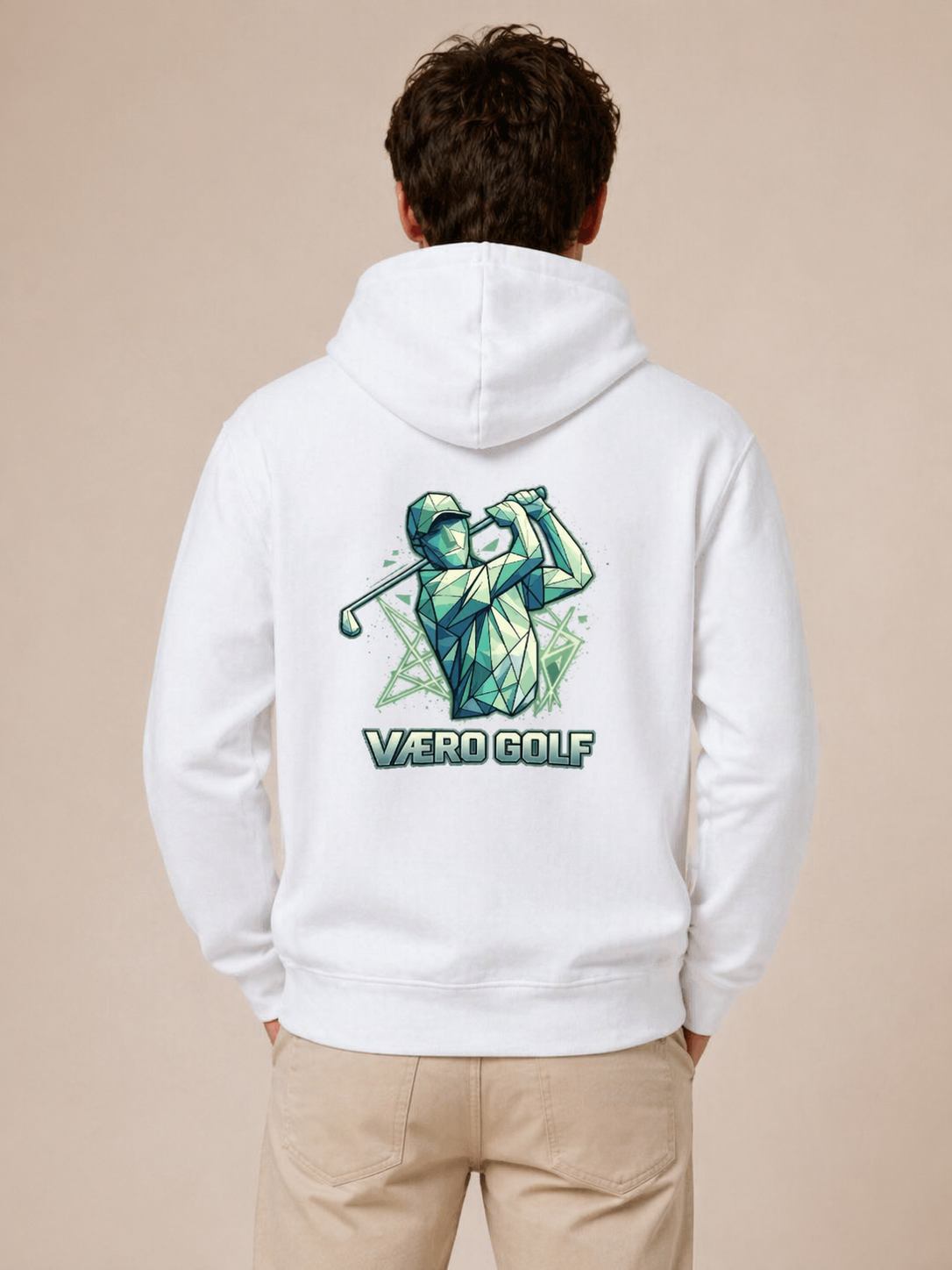 Person wearing a white hoodie with a golf-themed design on the back, set against a beige background.